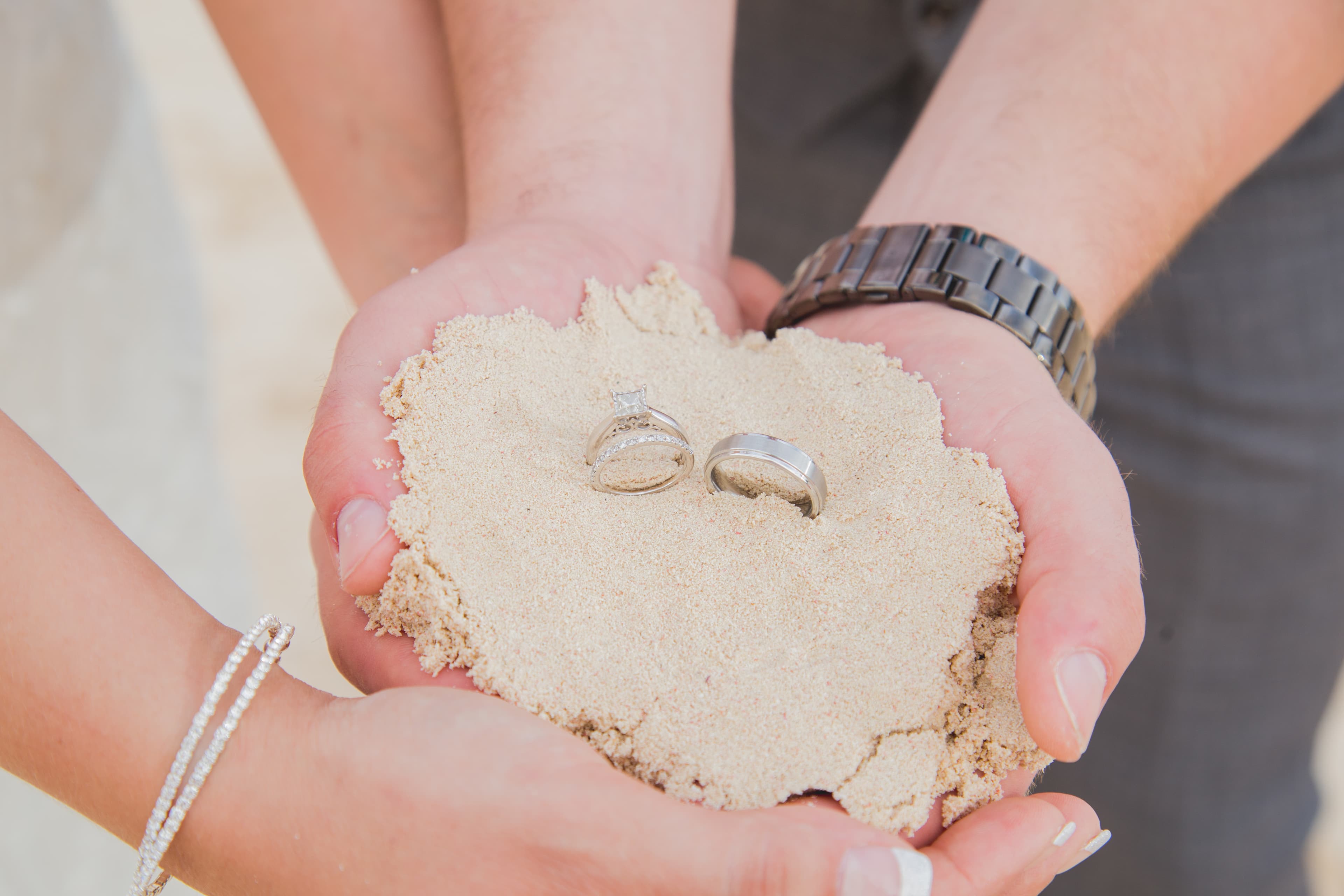 Bride and groom walking through a vineyard at dusk in golden Istrian light